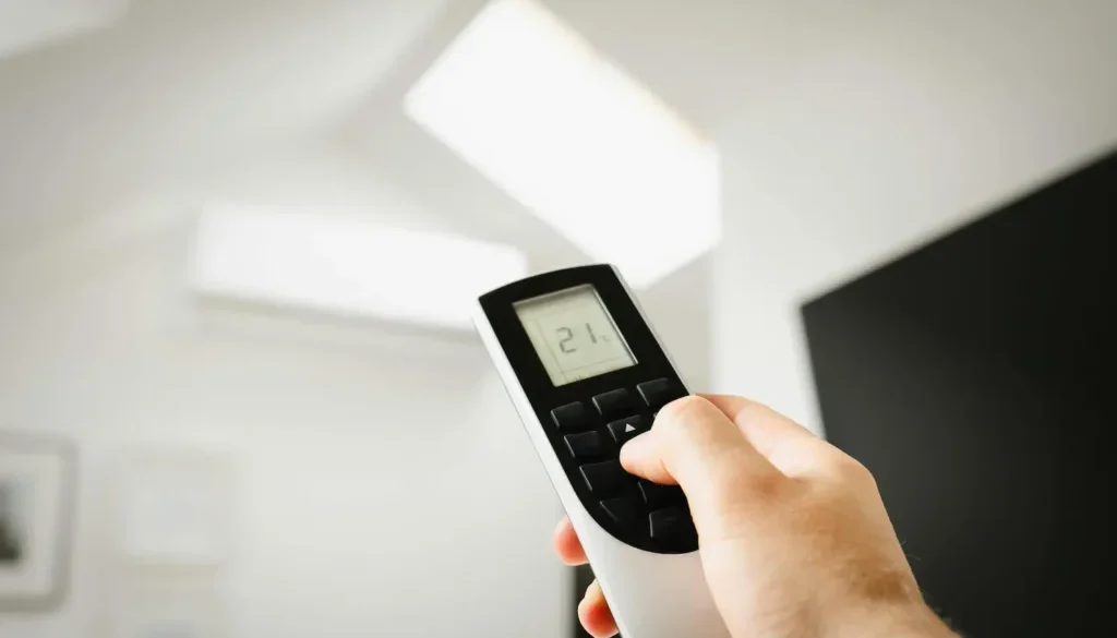 Adjusting AC temperature in Kochi home powered by rooftop solar system